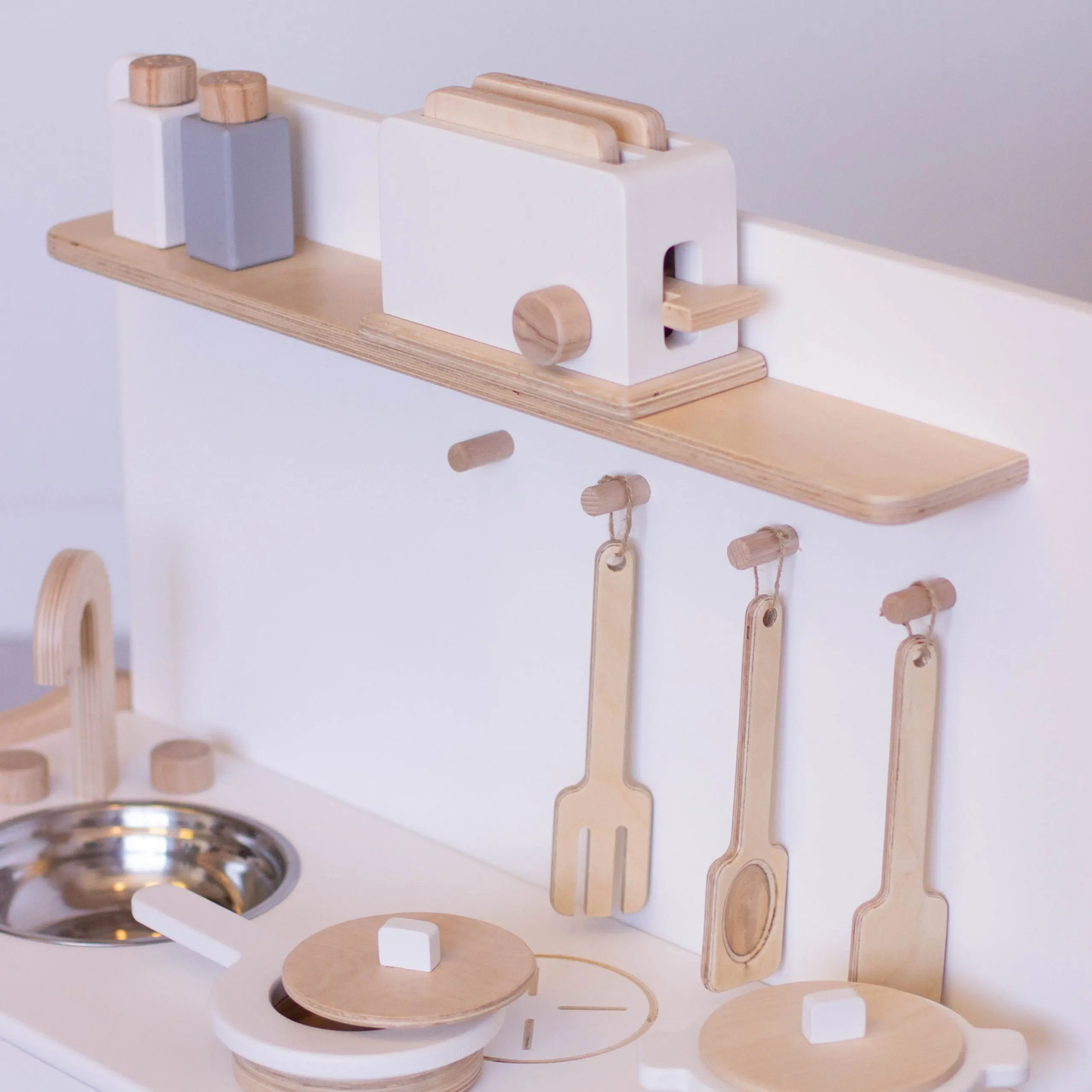 Toy kitchen combined with small shelving